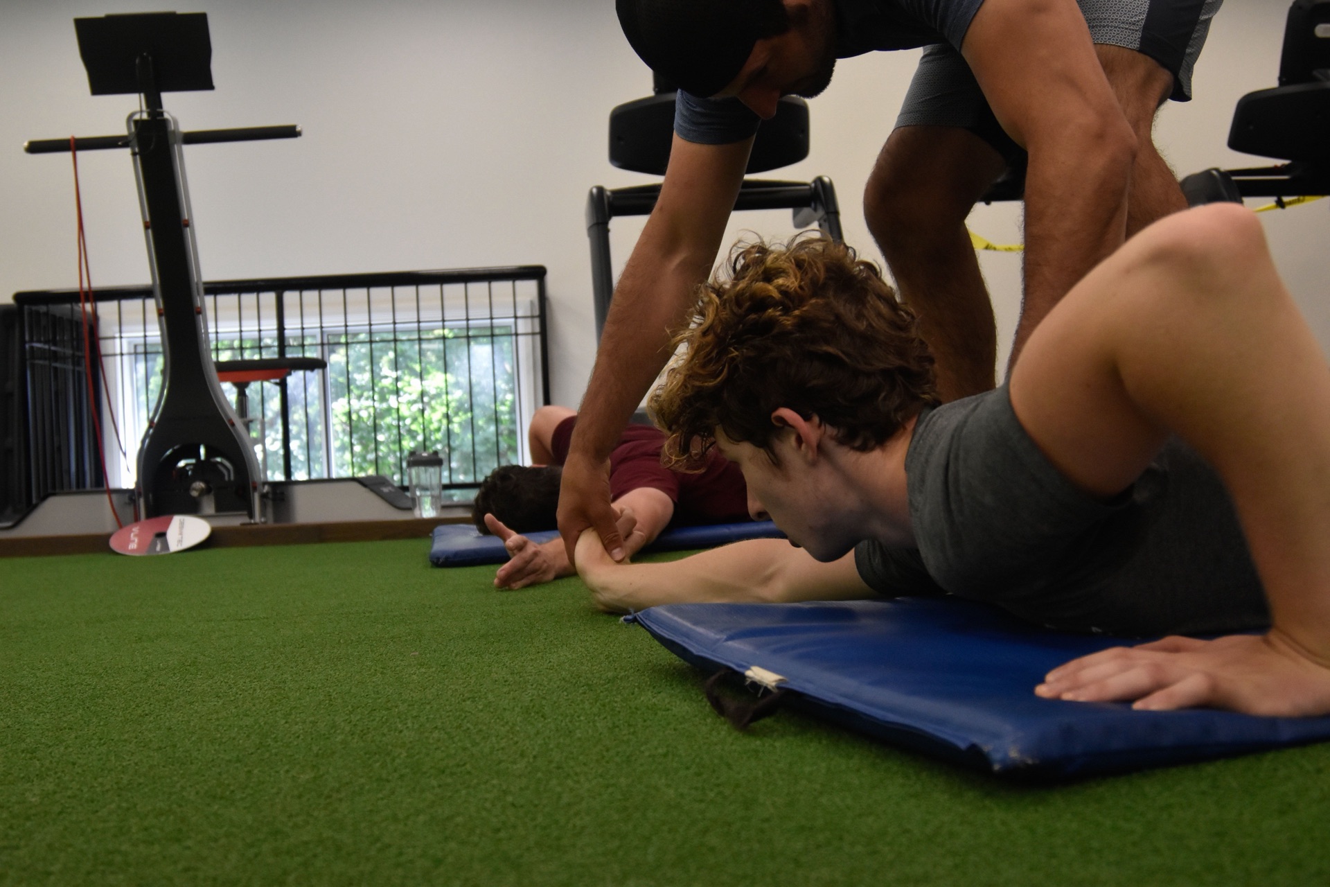 Guided stretching session during off-ice training